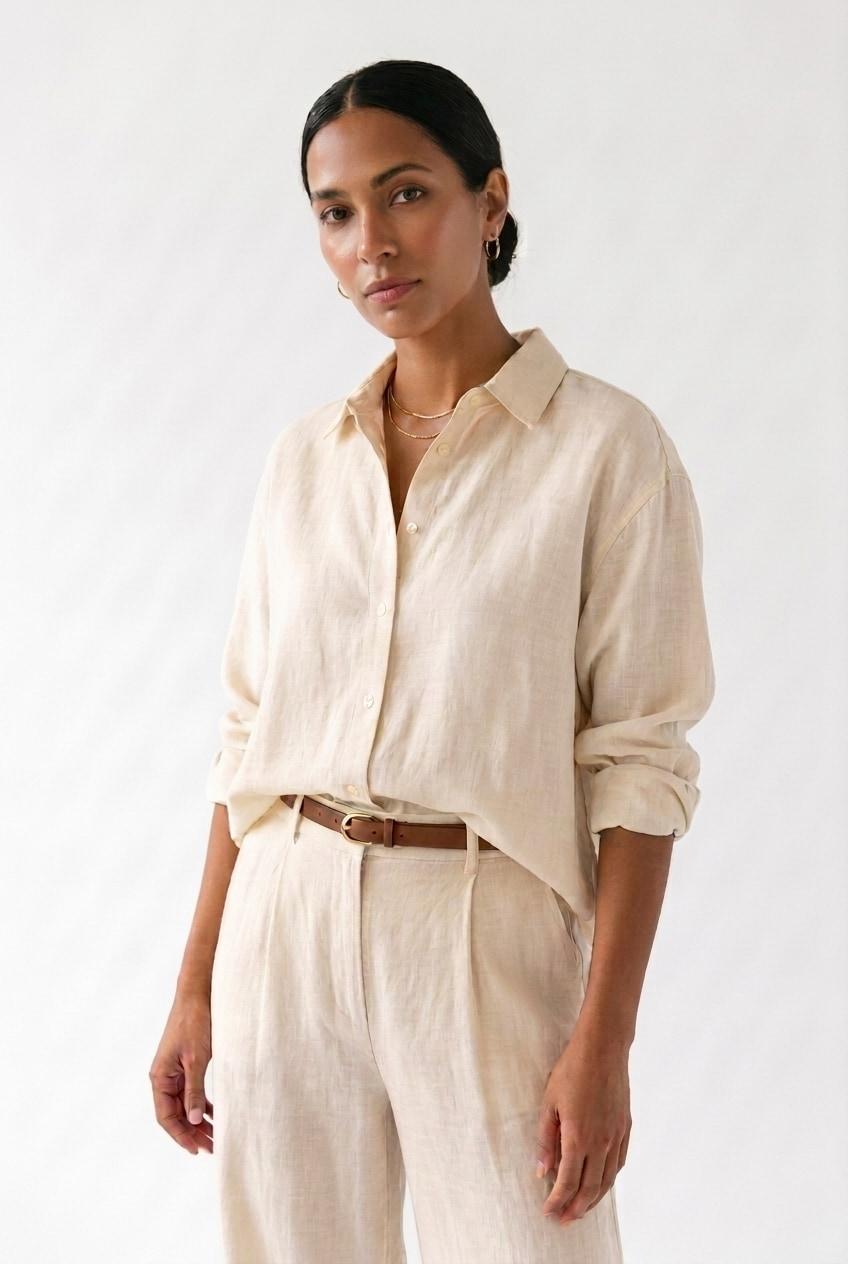 A loose linen shirt in ivory.