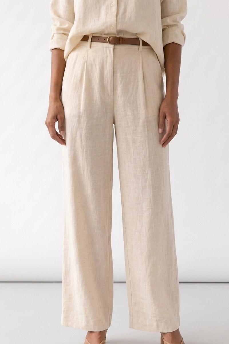 Wide-leg linen pants in ivory.